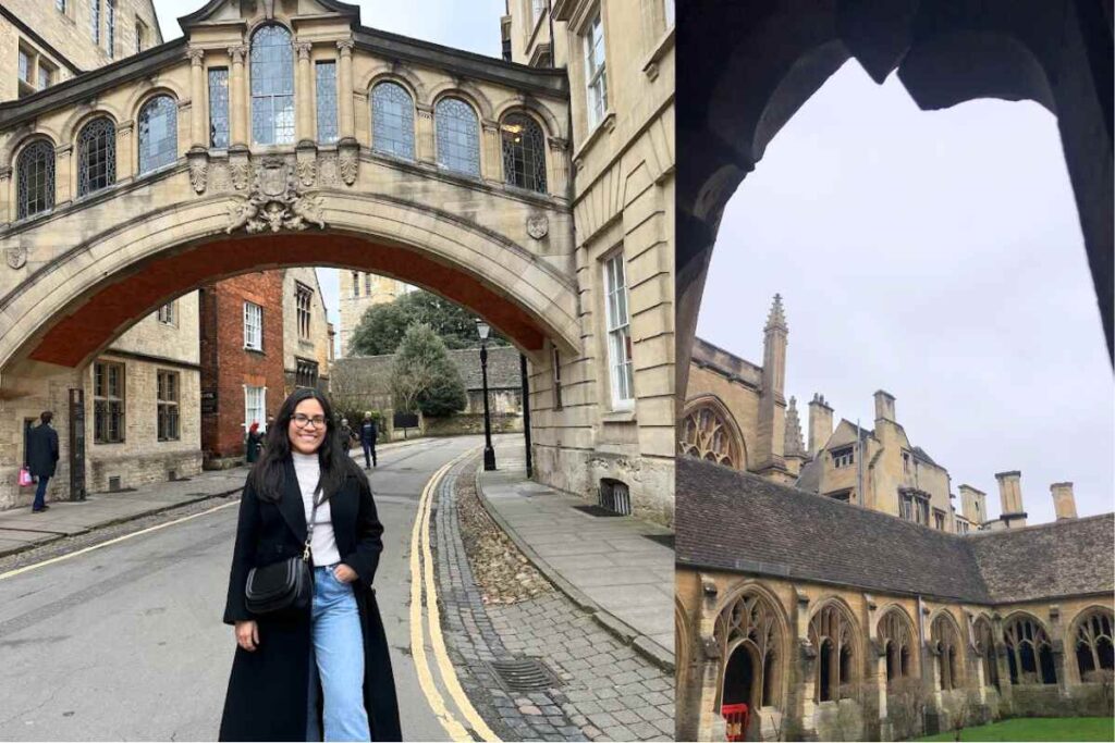 A woman standing under the "Bridge of Sighs" in Oxford, England, smiling with historic architecture in the background.