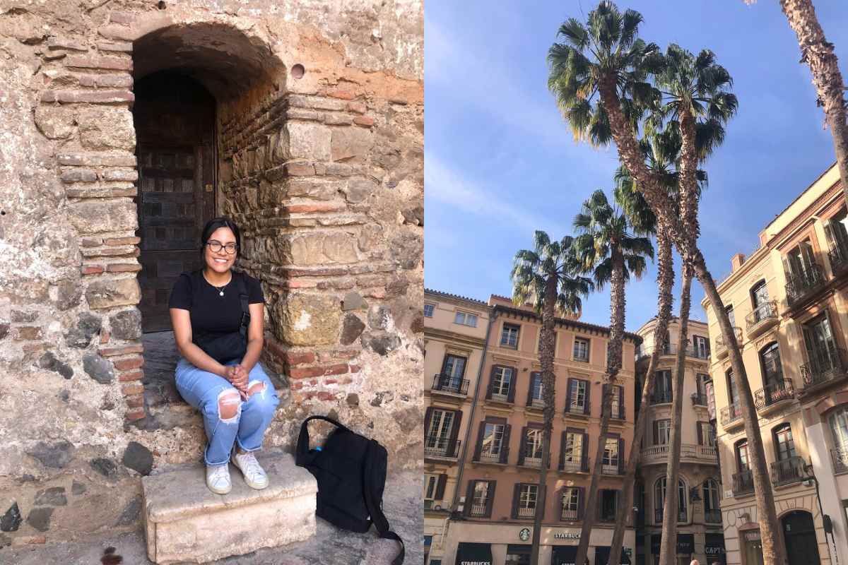 A woman sits on a stone bench within the arched entrance of an ancient brick structure, smiling at the camera. She wears a black t-shirt, ripped jeans, and white sneakers, with a black backpack resting beside her. The background showcases the rustic stone and brickwork of the historic site. Right side: A bright street in Malaga, Spain, lined with palm trees and elegant European buildings with wrought-iron balconies under a clear blue sky. 1 day in Malaga.