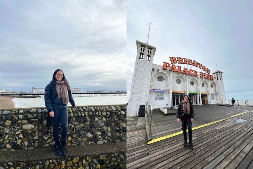 A traveler at the Brighton seafront, wearing a warm puffer jacket, black pants, and lace-up boots for winter travel. The second image features the Brighton Palace Pier entrance, with the traveler in a similar outfit, highlighting the importance of comfortable, waterproof footwear. This travel outfit aligns with recommendations for the best shoes for Europe travel.